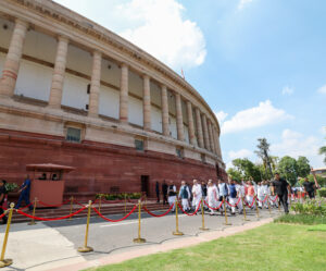 PM and Parliamentarians walking from old Parliament to New Parliament